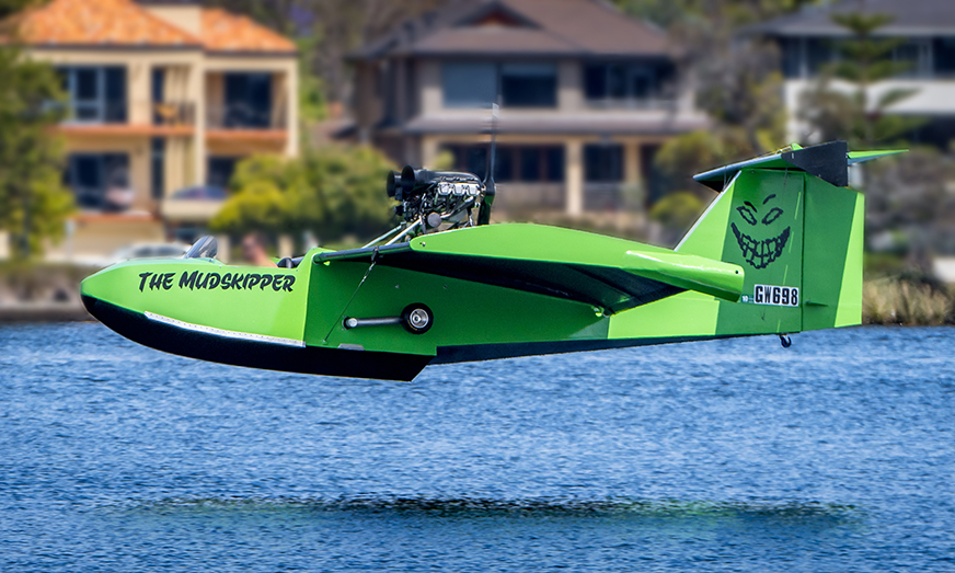 A wing-in-ground effect vessel flying across water