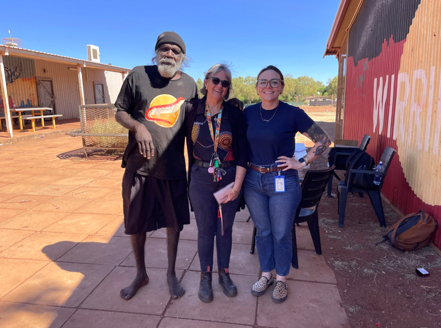 Courtney King (far right) from DTMI’s ACARP team with former Wirrimanu Aboriginal Corporation CEO Manne Ivory and Balgo resident Gary Njamme.