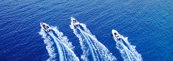 Image of three speedboats