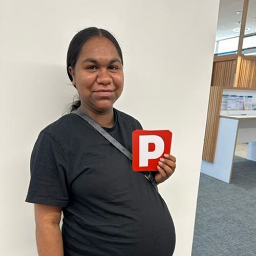Preveen after passing her practical driving assessment with the support of MEEDAC