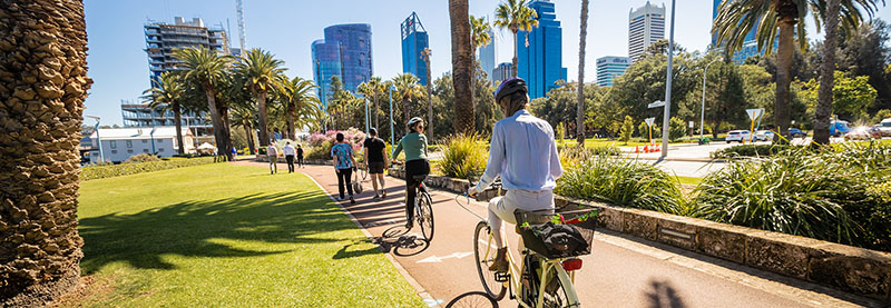 People cycling and walking on a shared path 